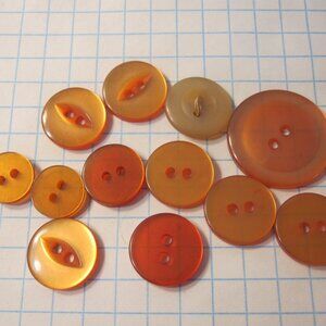 Vintage lot of Sewing Buttons - Mix of Translucent Orange Rounds
